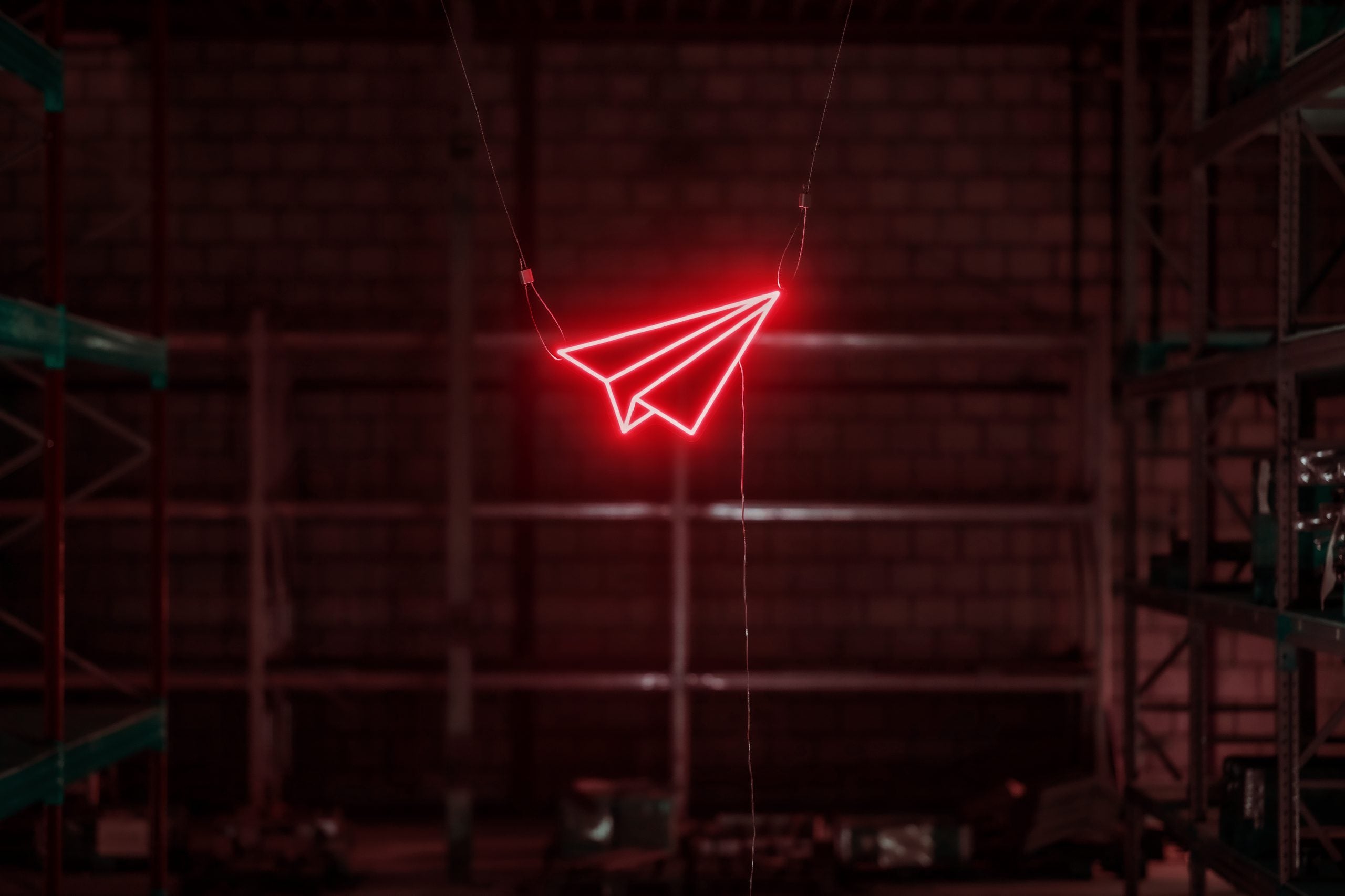 Paper plane neon sign